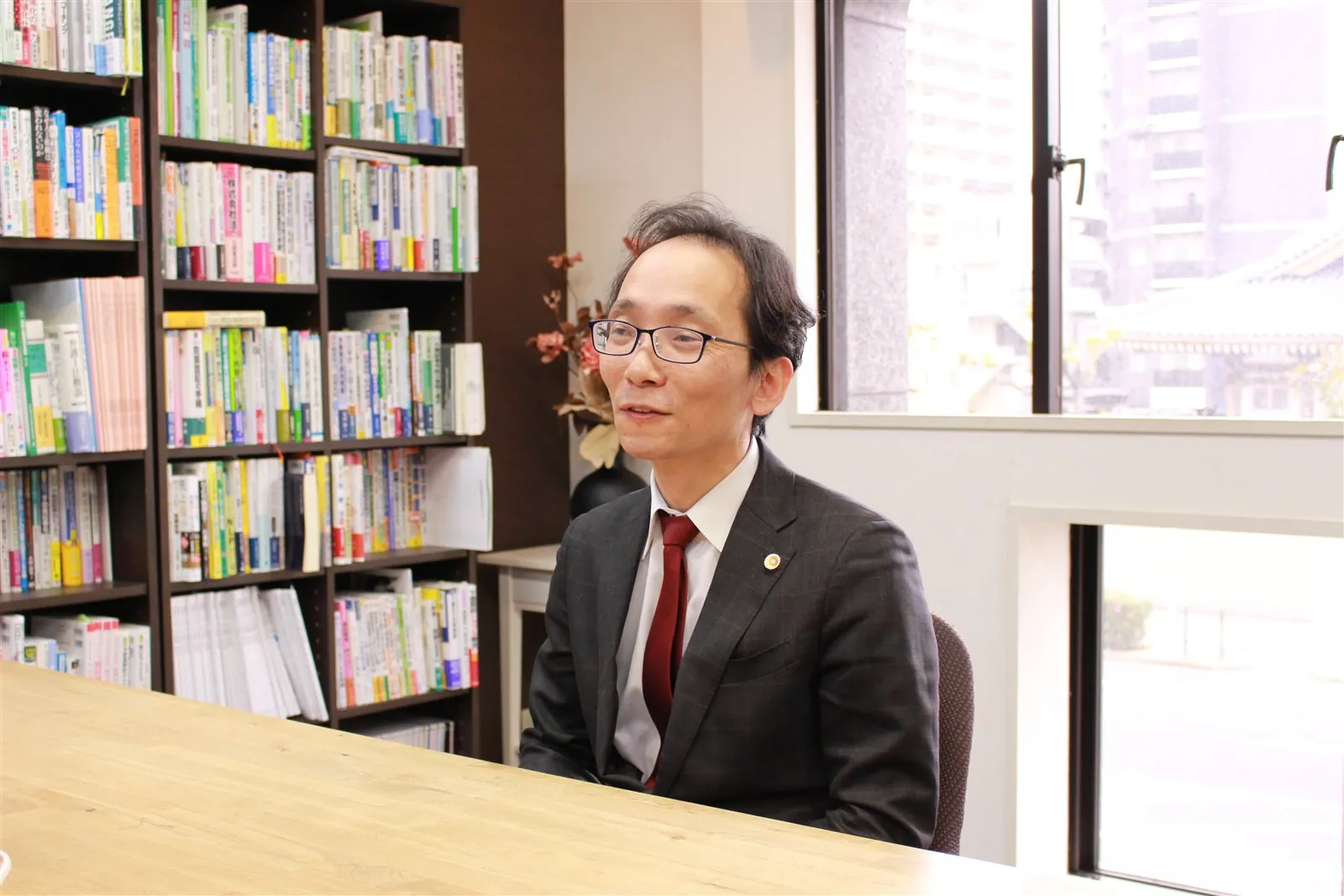 代表弁護士 井上 正人と相談者